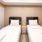 Simply Look Studio at 21st Floor De Prima Apartment By Travelio