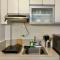 Cozy 1BR Condo Unit at 8 Spatial - Pequeno