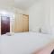 Homey and Tidy Studio Serpong Greenview Apartment By Travelio - 当格浪