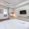 Warm and Cozy Style Studio Room at Paltrow City Apartment By Travelio
