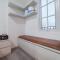 Warm and Cozy Style Studio Room at Paltrow City Apartment By Travelio