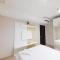 Minimalist and Cozy 1BR at Patraland Amarta Apartment By Travelio