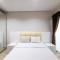 Minimalist and Cozy 1BR at Patraland Amarta Apartment By Travelio