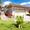 WHITE CORAL Exceptional 4BR KaMilo Home with Ocean View and Bikes - وايكولوا