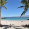 WHITE CORAL Exceptional 4BR KaMilo Home with Ocean View and Bikes - وايكولوا