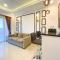 Restful and Elegant 1BR Patraland Amarta Apartment By Travelio