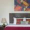 StayVista's Casa Ember - Relax with a Pool Table, Gazebo, and Inviting Swimming Pool - لونافالا