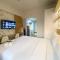 Minimalist and Homey Studio The Alton Apartment By Travelio