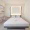Cozy Stay Studio Room at Altuz Seturan Yogyakarta Apartment By Travelio