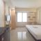 Cozy Stay Studio Room at Altuz Seturan Yogyakarta Apartment By Travelio