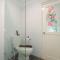 Cozy Stay Studio Room at Altuz Seturan Yogyakarta Apartment By Travelio