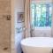 Sink into the Luxe Corner Tub at an Upscale, Spacious Home - Jonesboro