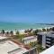 Confortável Flat com vista parcial do mar de Intermares