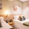 Hotel Stay Here Suites