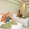 Hotel Stay Here Suites