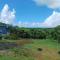 Rooster Run Glamping Camping has rooftop and off the ground Glamping experience for 1 to 16 in a single tent and views of The Rain Forrest and to Culebra across the Atlantic Ocean w Tents, Linens, Deluxe Air Beds, Warm Shower and More at a Great Price - Vieques