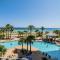 PRIVATE BEACH FRONT LUXURY CONDO, AMAZING VIEWS, INDiGO E, 5-STAR, - 2 BALCONES , "CHOICE AWARD"!