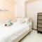 Aussie Shack - 2BR Modern Condo with Skyline View - Manila