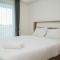 Nice and Homey Studio at Bintaro Embarcadero Apartment By Travelio