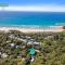 Whispering Trees by Discover Stradbroke