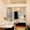 1 BR Condo with fast Wifi near Business Centers and Malls - Manila