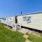 Caravan With Large Decking At Coopers Beach Holiday Park Ref 49036Ts