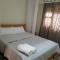 NileBnb-1 minute to The Hangout Furnished Kitchen, Parking and Private Patio - Джинджа