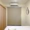 Spacious and Homey Apartment 2BR at Meikarta By Travelio