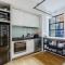 The Iron Loft on Collins - Heritage Industrial Charm