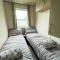 CaravanSleeps6-HotTub-Garden-WaterWonderland