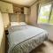 CaravanSleeps6-HotTub-Garden-WaterWonderland