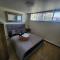 Private room with shared space in a basement - Sudbury