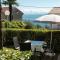 Charming Apartment with Sea Views and Shared Pool - 洛夫兰