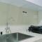Elegant 1BR without Living Room at Bintaro Embarcadero Suites Apartment By Travelio