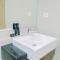 Elegant 1BR without Living Room at Bintaro Embarcadero Suites Apartment By Travelio