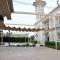 Dreamland Stylish 2BD with a garden and pool access - السادس من أكتوبر