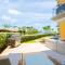 Beachfront - Garden Delight 2BR condo - E125-2