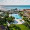 Beachfront - Garden Delight 2BR condo - E125-2