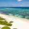 Timmys Place - Charming Oceanfront Villa with Direct Beach Access and Scenic Views - 浮木村