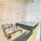 Quite 2BR Apartment AC in Living Room at The Jarrdin Cihampelas By Travelio