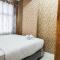 Luxurious and Comfy 2BR at Vida View Makassar Apartment By Travelio Luxurious and Comfy 2BR at Vida View Makassar Apartment By Travelio