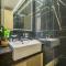Minimalist 1BR in Binghatti Luna, JVC by Deluxe Holiday Homes