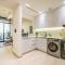 Minimalist 1BR in Binghatti Luna, JVC by Deluxe Holiday Homes