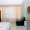 Fully Furnished with Comfortable Design Studio Springlake Summarecon Apartment By Travelio - بيكاسي
