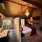 Wellness Tuin - Boudoir Suite - Ultieme Partner Beleving met Jacuzzi en Openhaard en privé Sauna in Romantische stijl - Horst