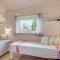 Three-Bedroom Holiday Home With A Fireplace In Melby