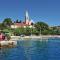 Awesome Home In Praznica With Jacuzzi