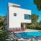 Four-Bedroom Holiday Home In Premantura