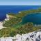 Four-Bedroom Holiday Home In Kornati