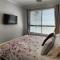Minutes to the Beach! King Bed with TV, Spa Bath